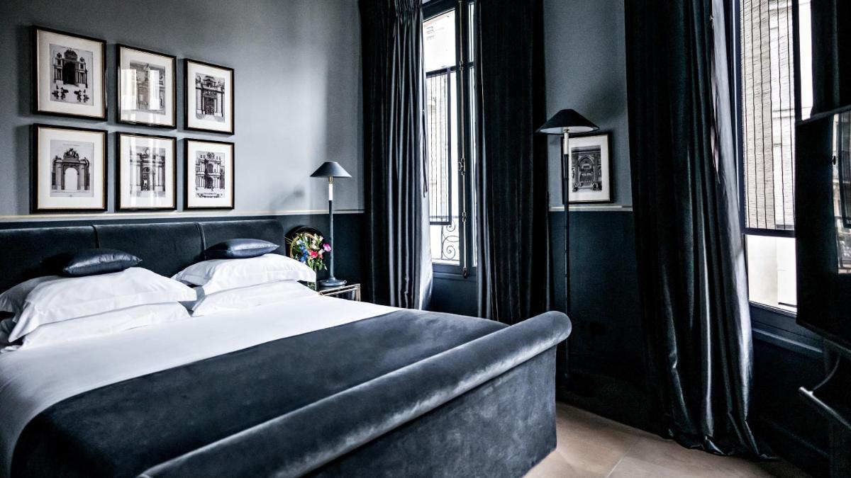 Un ou plusieurs lits dans un hébergement de l'établissement Monsieur George Hotel & Spa - Champs-Elysées