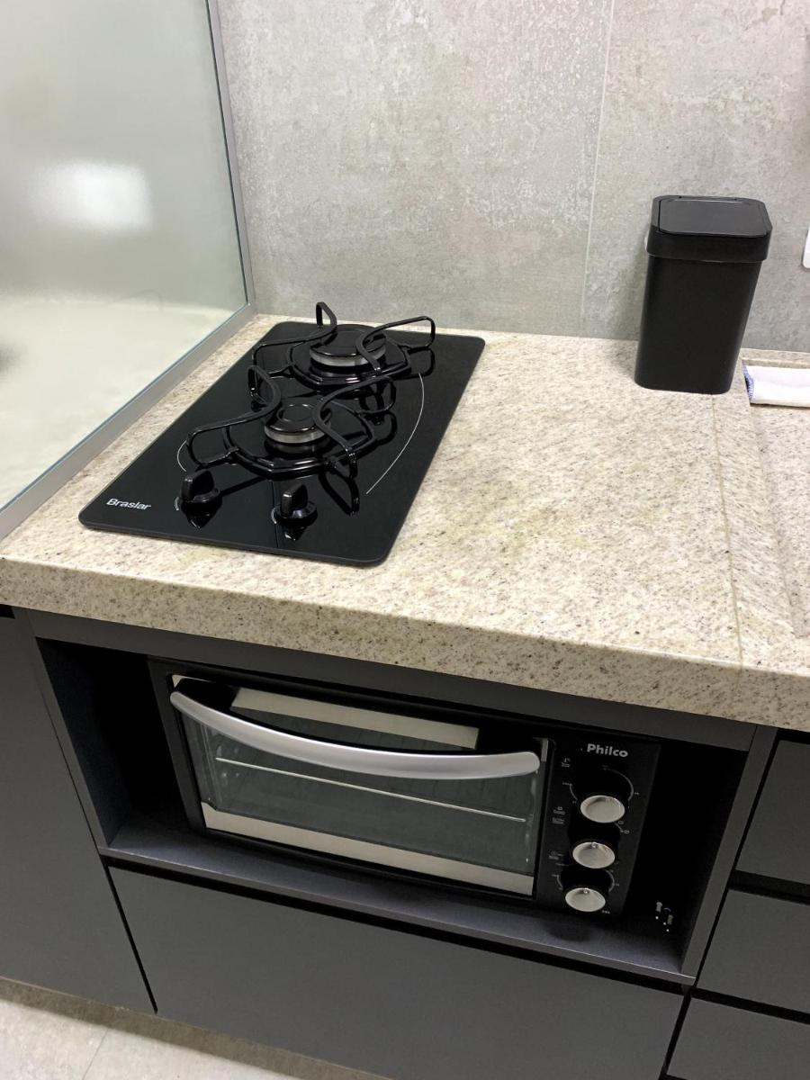 Apto com ar no centro perto de tudo - Housity