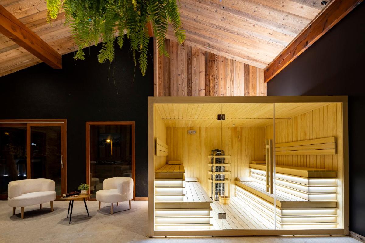 Coin salon dans l'établissement Hôtel et Spa Le Vermont
