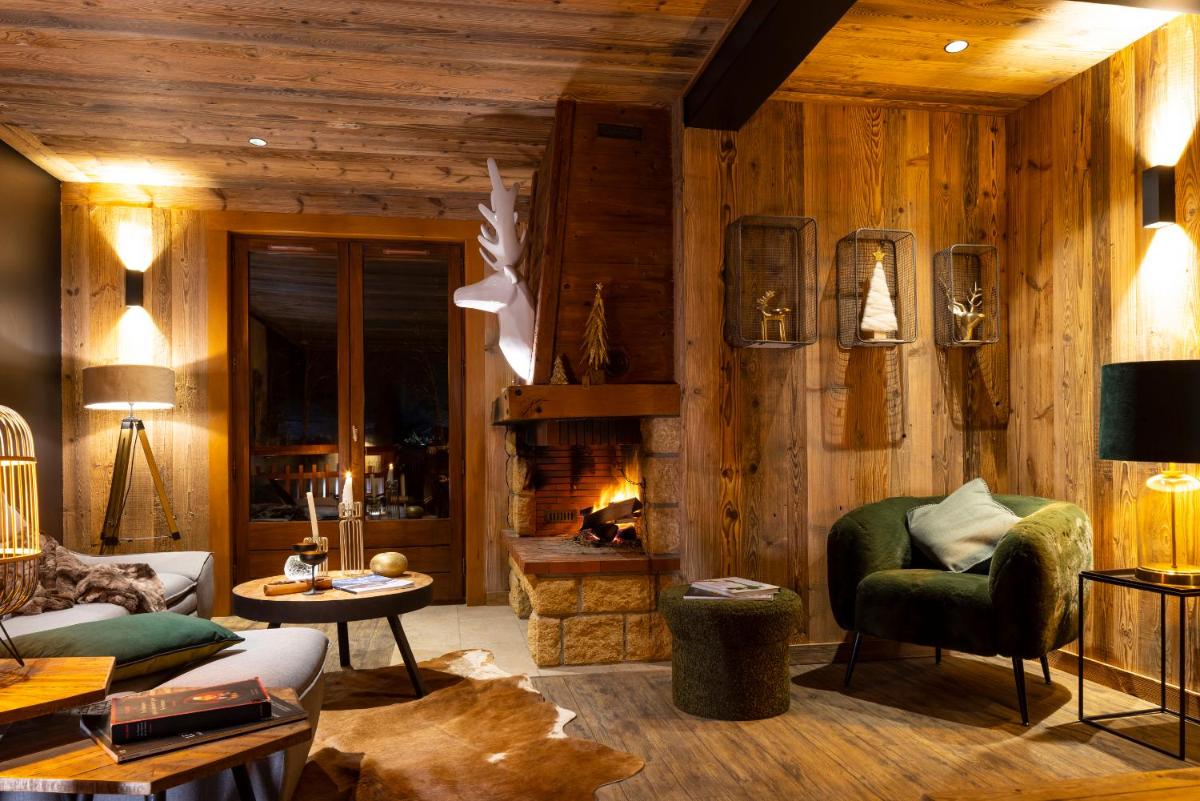 Coin salon dans l'établissement Hôtel et Spa Le Vermont