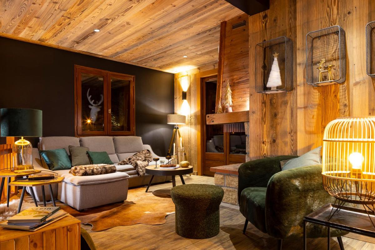 Coin salon dans l'établissement Hôtel et Spa Le Vermont
