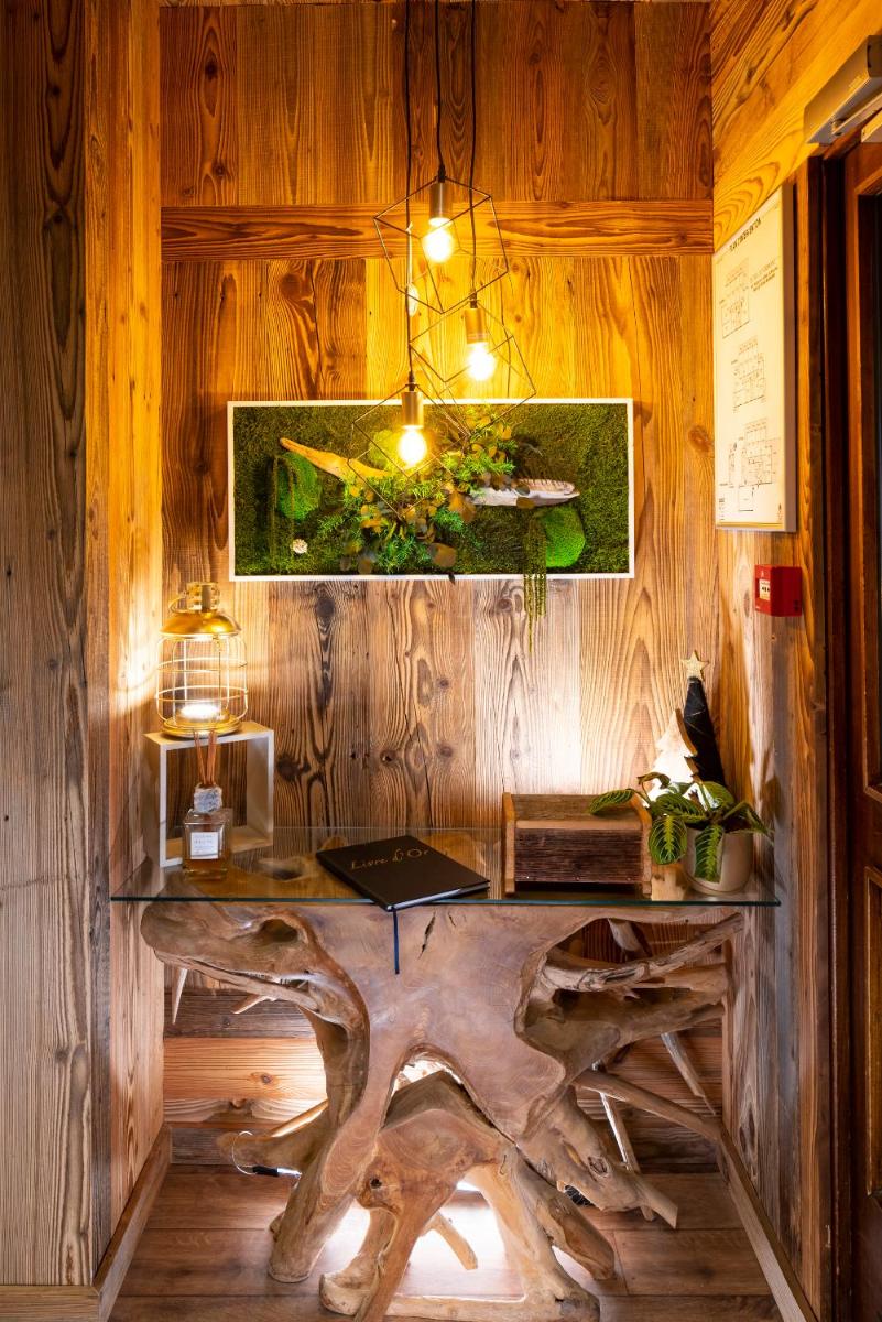 Coin salon dans l'établissement Hôtel et Spa Le Vermont