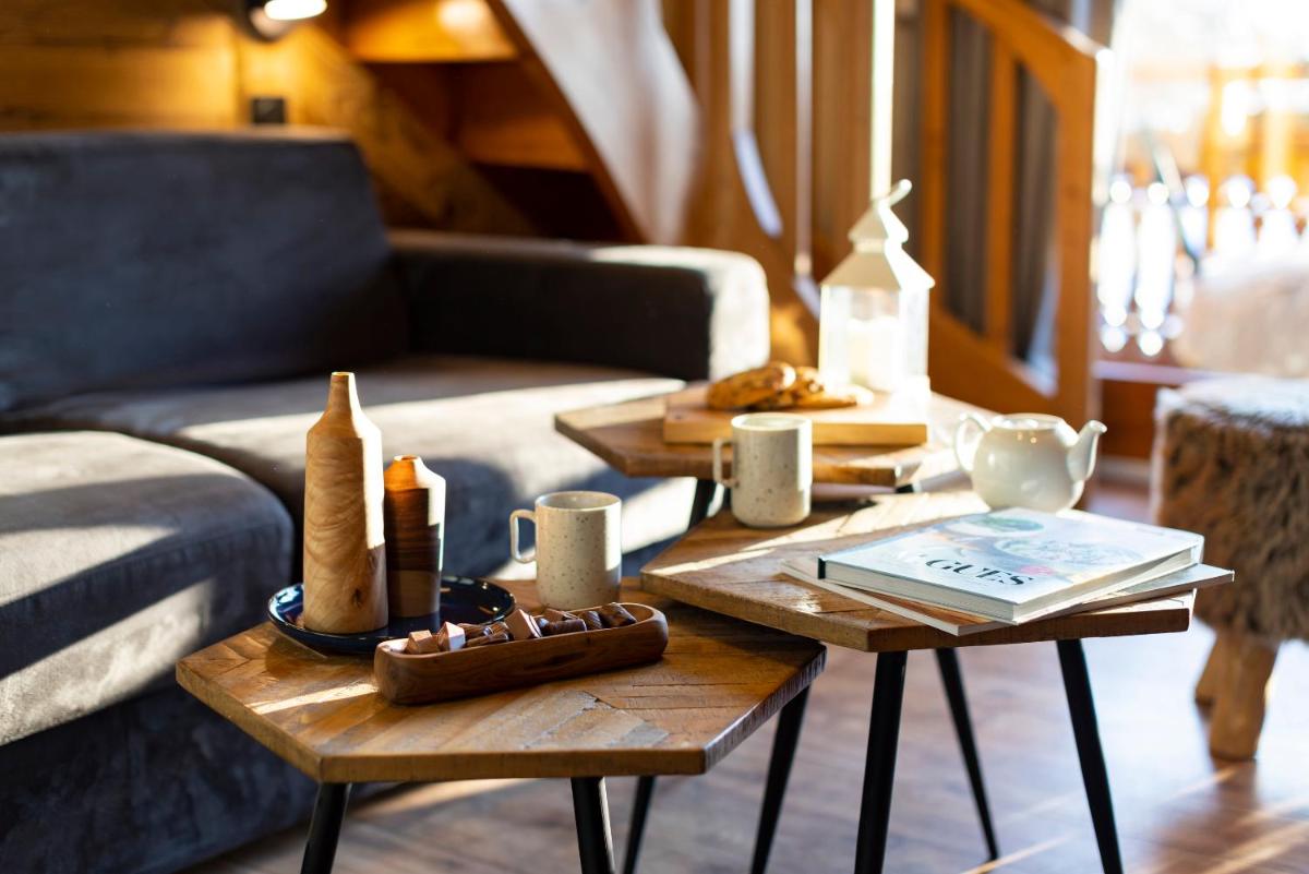 Coin salon dans l'établissement Hôtel et Spa Le Vermont