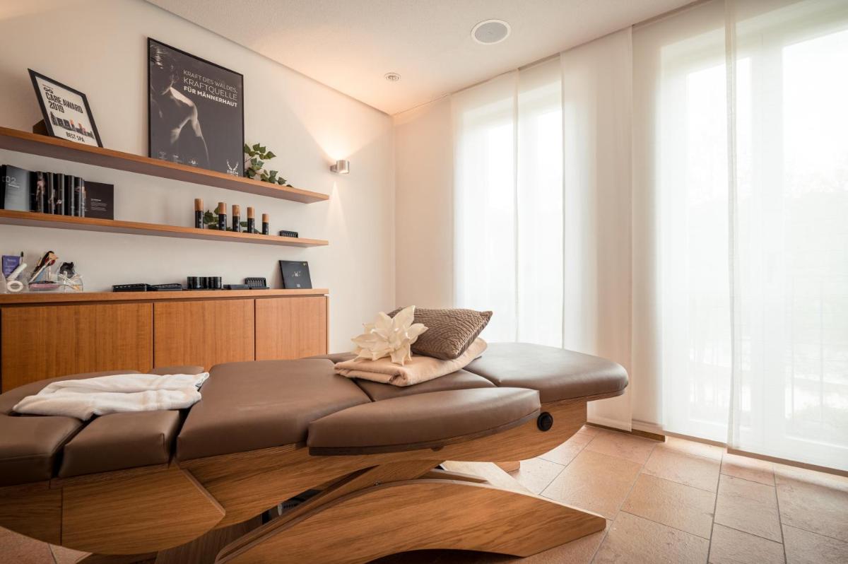 Ein Sitzbereich in der Unterkunft Neumühle Resort & Spa
