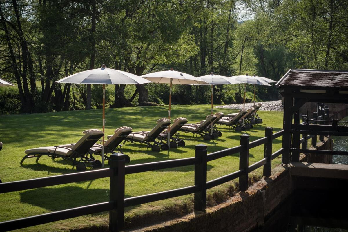 Ein Garten an der Unterkunft Neumühle Resort & Spa