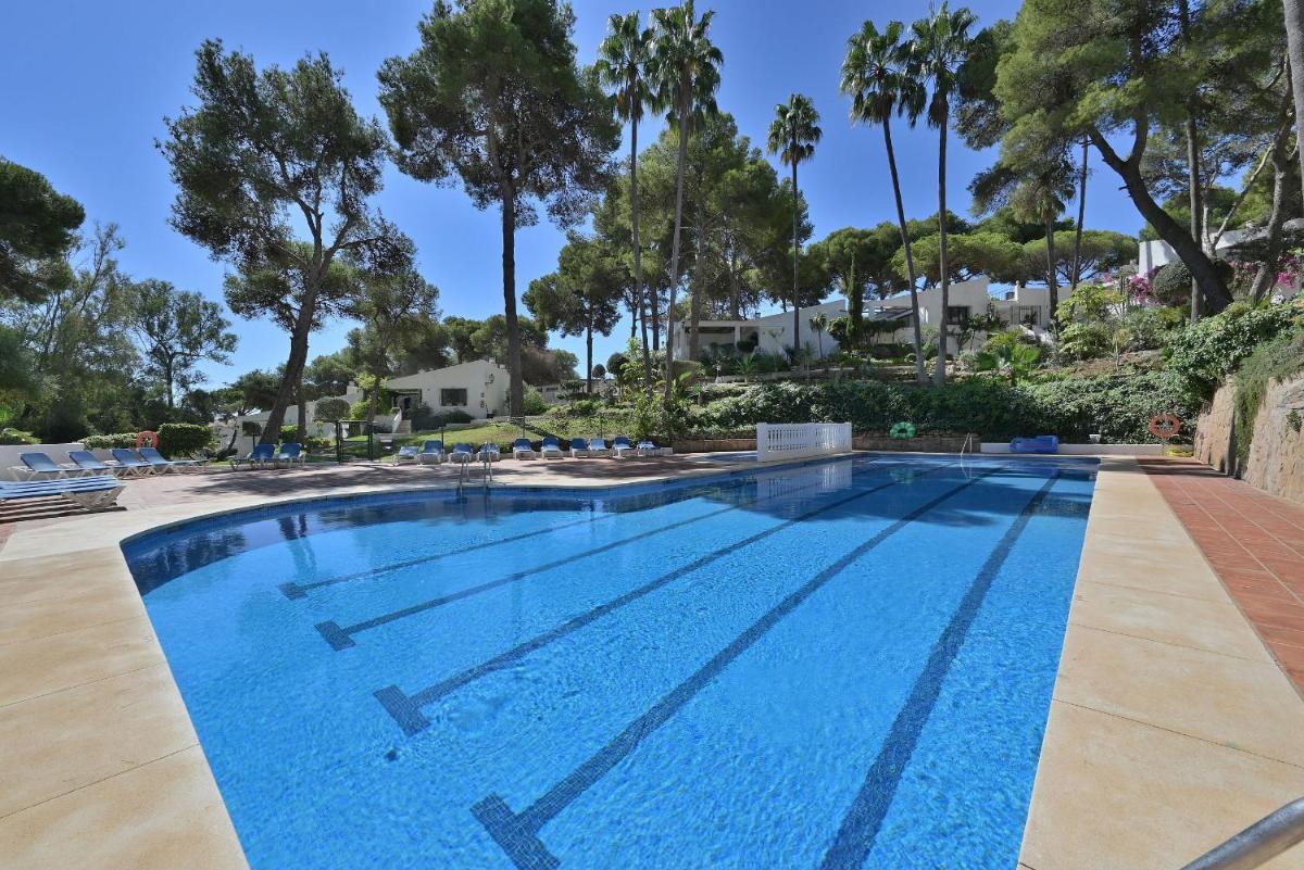Bungalow with large terrace in a quiet park - beach nearby - Housity