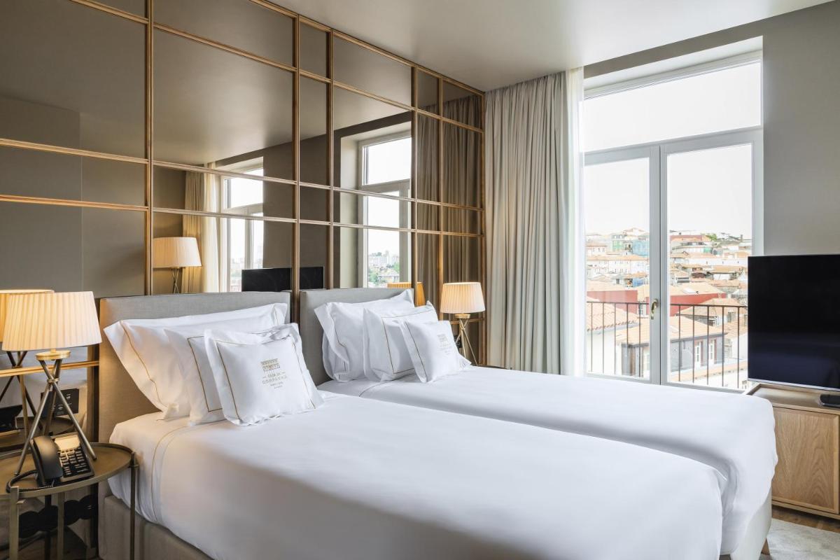 Uma cama ou camas num quarto em Casa da Companhia Hotel & Spa, Vignette Collection by IHG