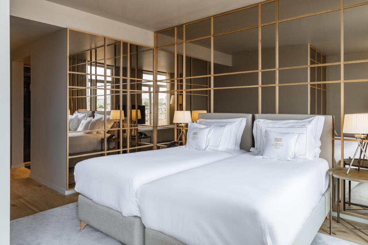 Uma cama ou camas num quarto em Casa da Companhia Hotel & Spa, Vignette Collection by IHG