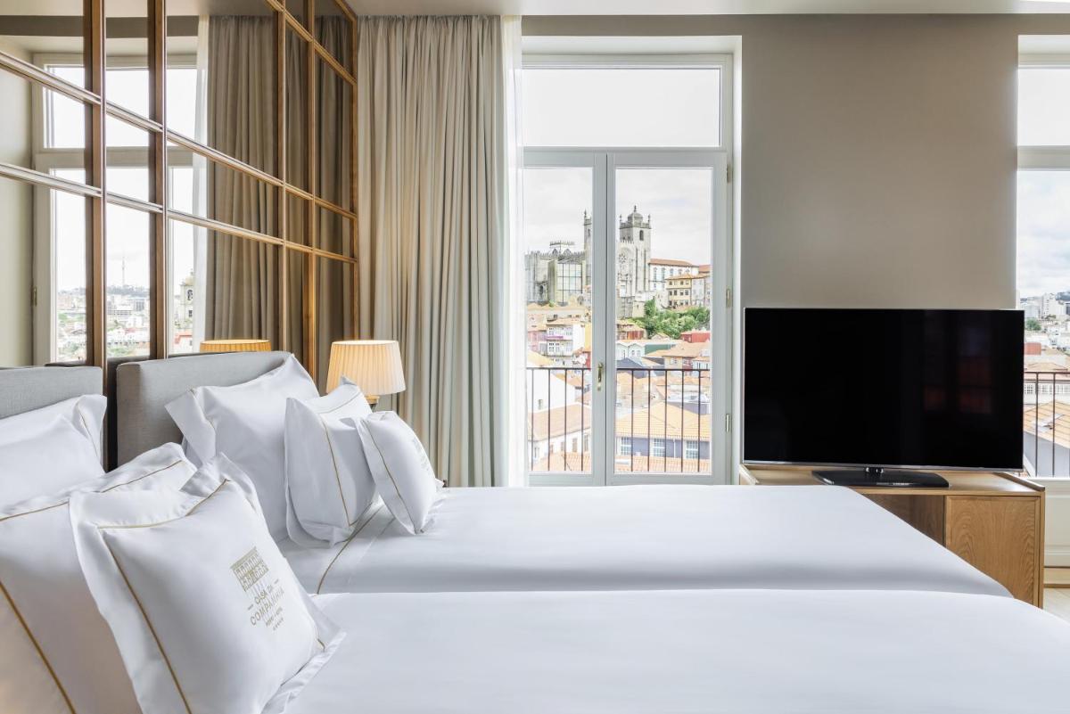 Uma cama ou camas num quarto em Casa da Companhia Hotel & Spa, Vignette Collection by IHG