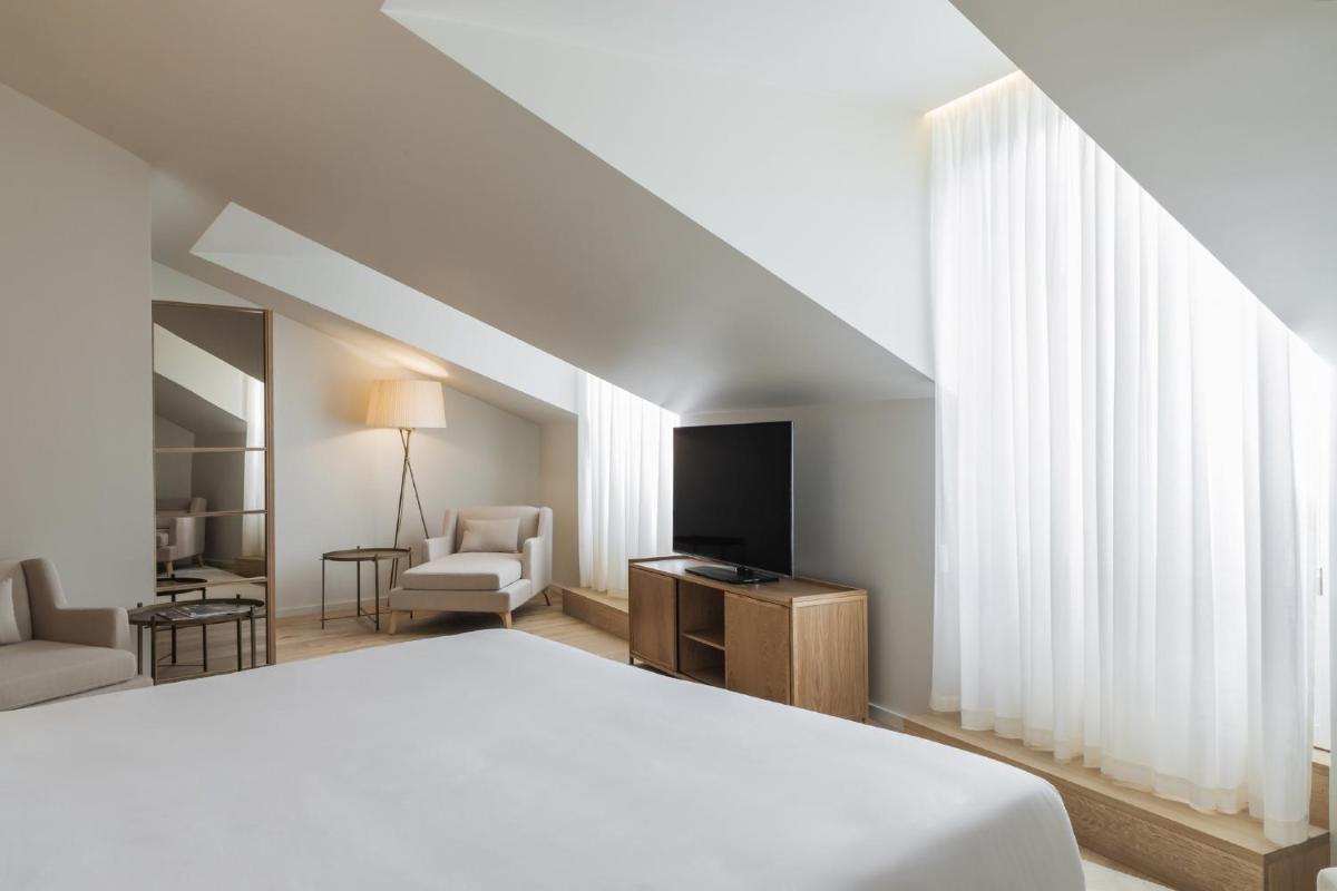 Uma cama ou camas num quarto em Casa da Companhia Hotel & Spa, Vignette Collection by IHG