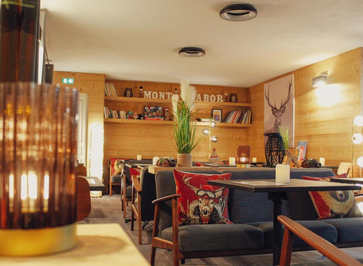 Coin salon dans l'établissement Hôtel Mont Thabor Serre Chevalier