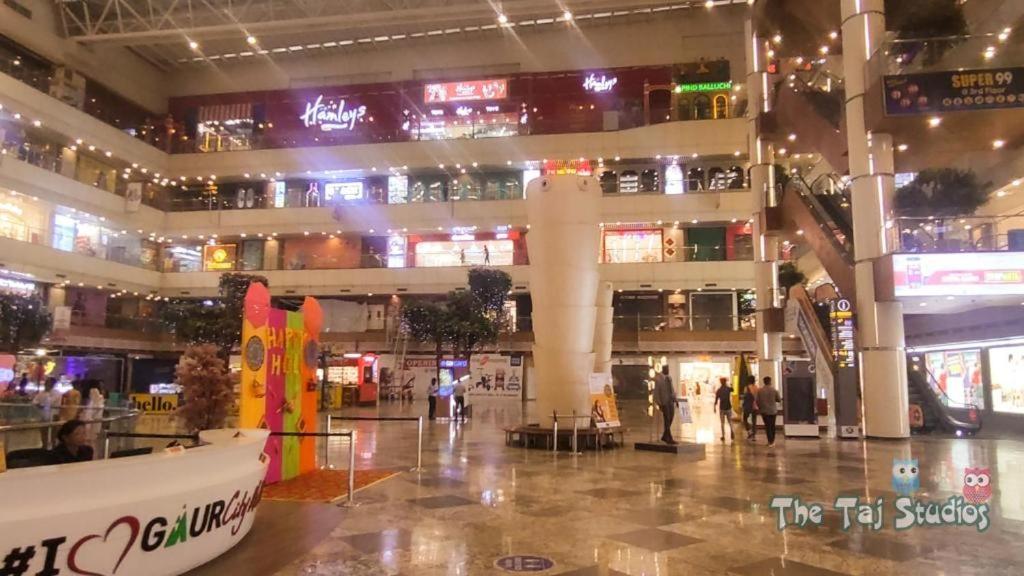 Taj Studios- 1st time in Noida, Stay at Serviced Studio Apartment Gaur City Mall - Housity