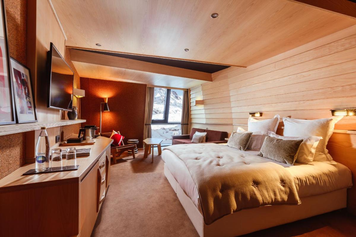 Un ou plusieurs lits dans un hébergement de l'établissement Altapura Hôtel & Spa Val Thorens