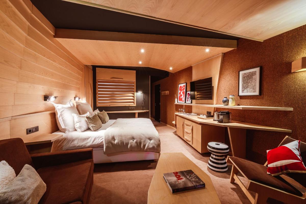 Un ou plusieurs lits dans un hébergement de l'établissement Altapura Hôtel & Spa Val Thorens
