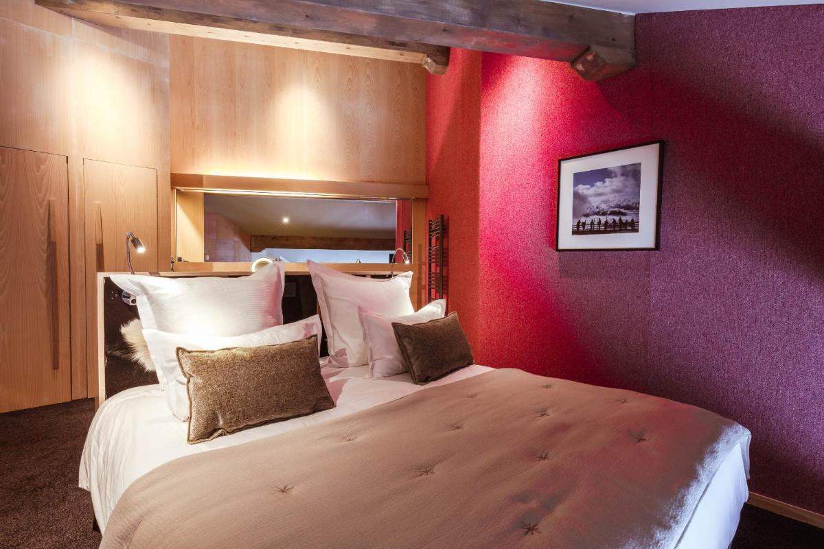 Un ou plusieurs lits dans un hébergement de l'établissement Altapura Hôtel & Spa Val Thorens