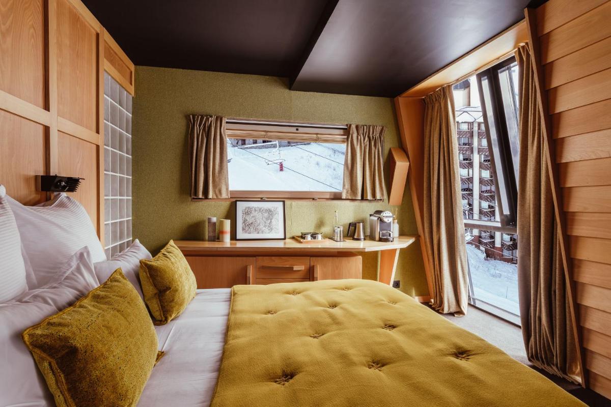 Un ou plusieurs lits dans un hébergement de l'établissement Altapura Hôtel & Spa Val Thorens