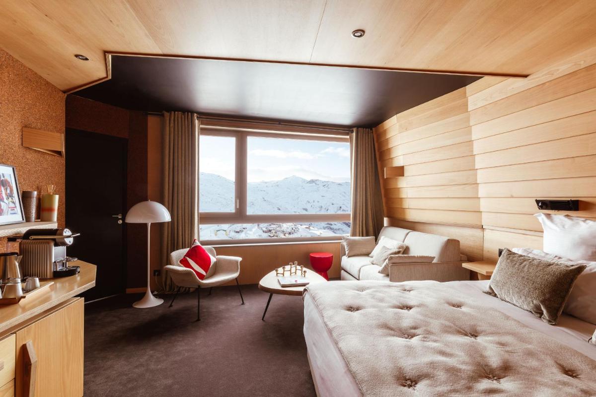 Un ou plusieurs lits dans un hébergement de l'établissement Altapura Hôtel & Spa Val Thorens