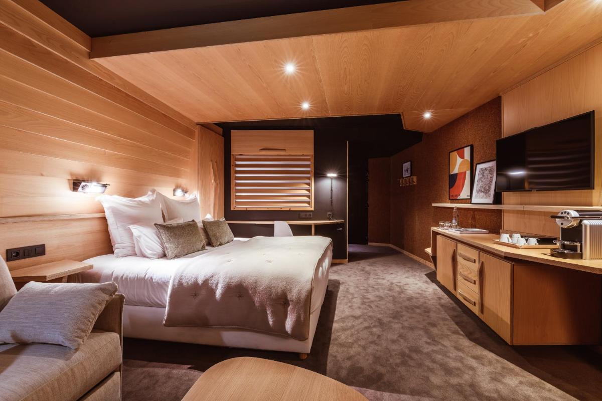 Un ou plusieurs lits dans un hébergement de l'établissement Altapura Hôtel & Spa Val Thorens