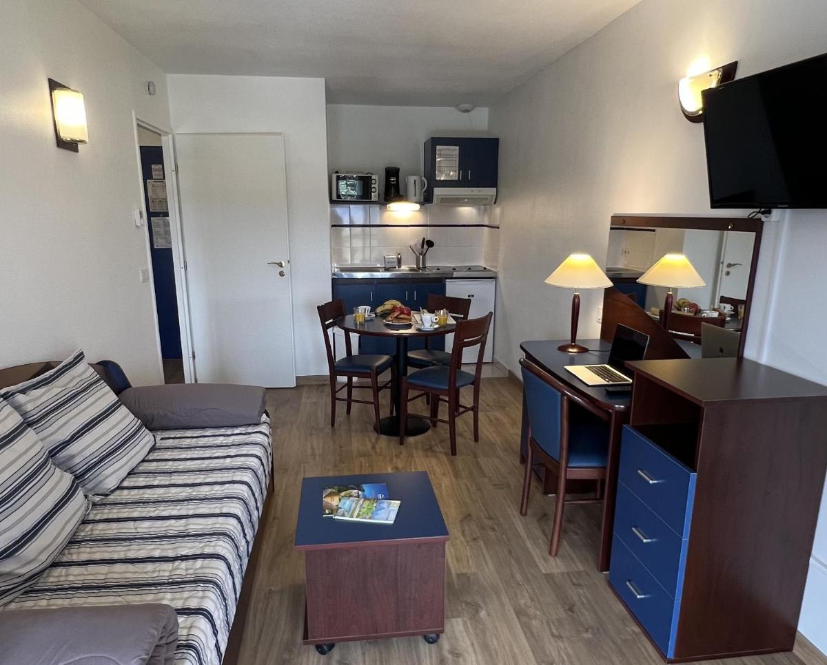 Cuisine ou kitchenette dans l'établissement Vacancéole - Appart'Vacances Pyrénées 2000