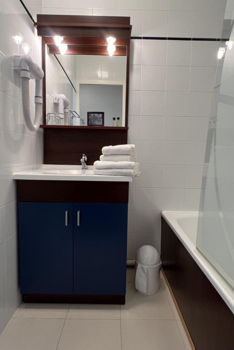 Salle de bains dans l'établissement Vacancéole - Appart'Vacances Pyrénées 2000