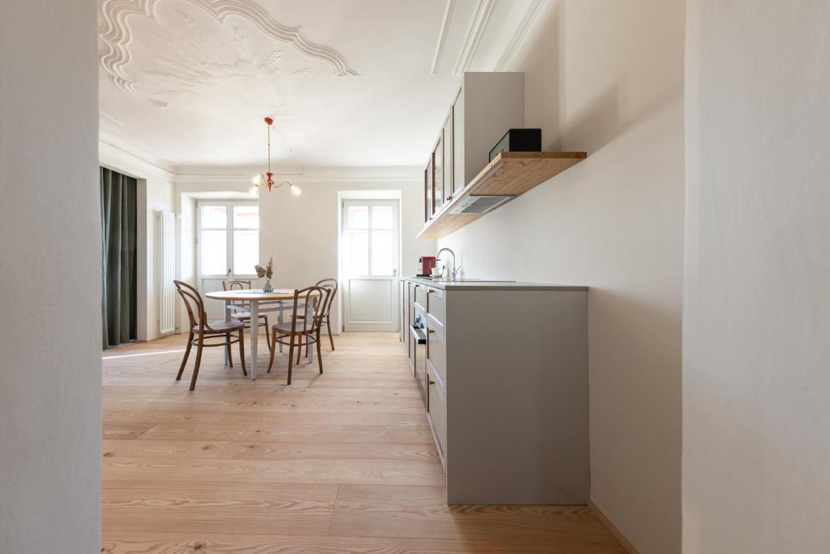 Smart Suites Kaltern - Apartments am Kalterer See - Housity