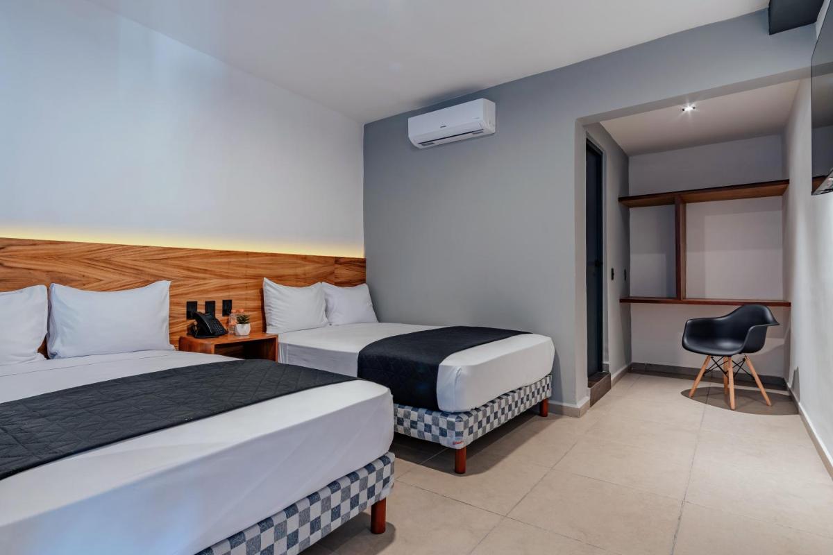 Hotel Mody Merida - Housity