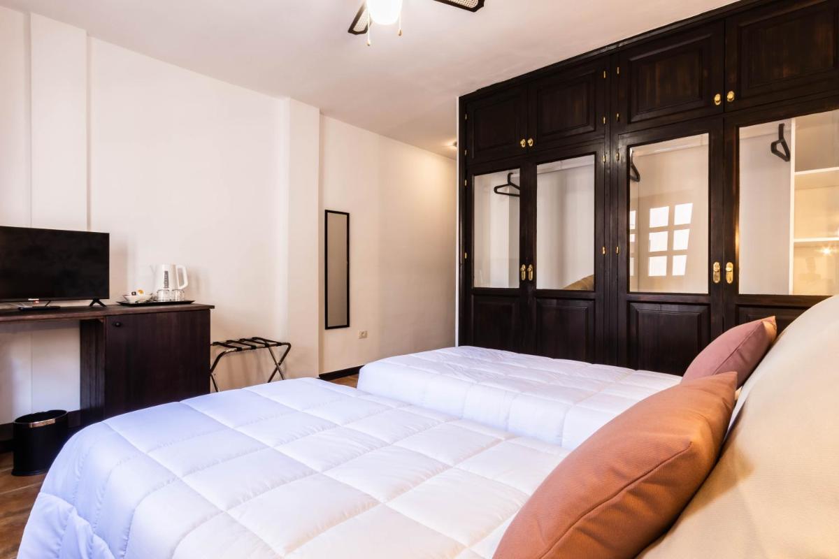 Cama o camas de una habitación en Hotel Ecolife Tenerife