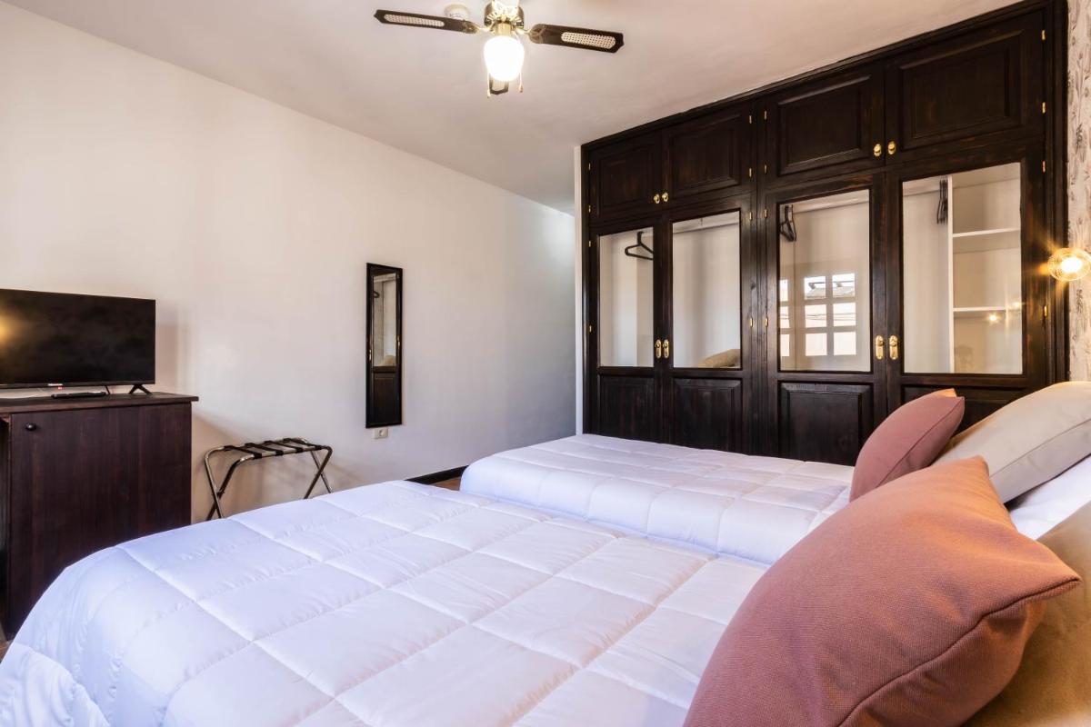 Cama o camas de una habitación en Hotel Ecolife Tenerife
