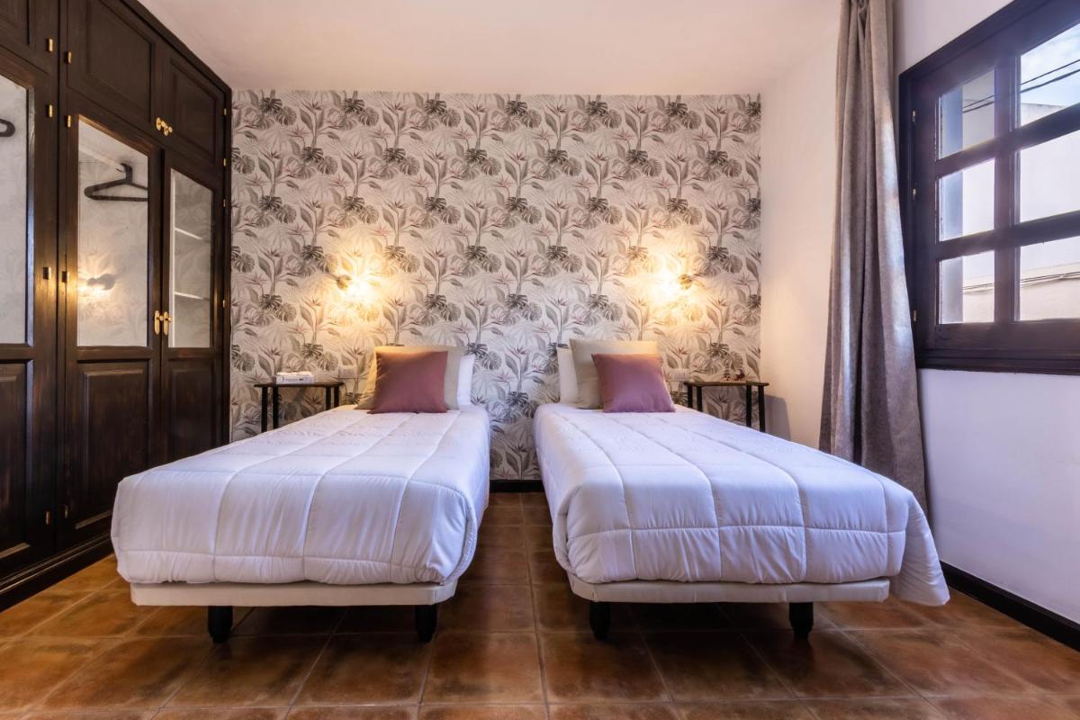 Cama o camas de una habitación en Hotel Ecolife Tenerife
