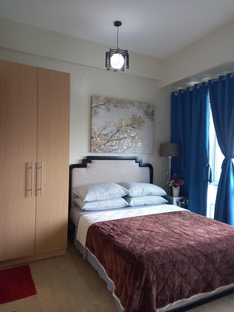 Suitetrails - Studio Unit, Homely Condo at One Madison Place near Iloilo Business Park PH.