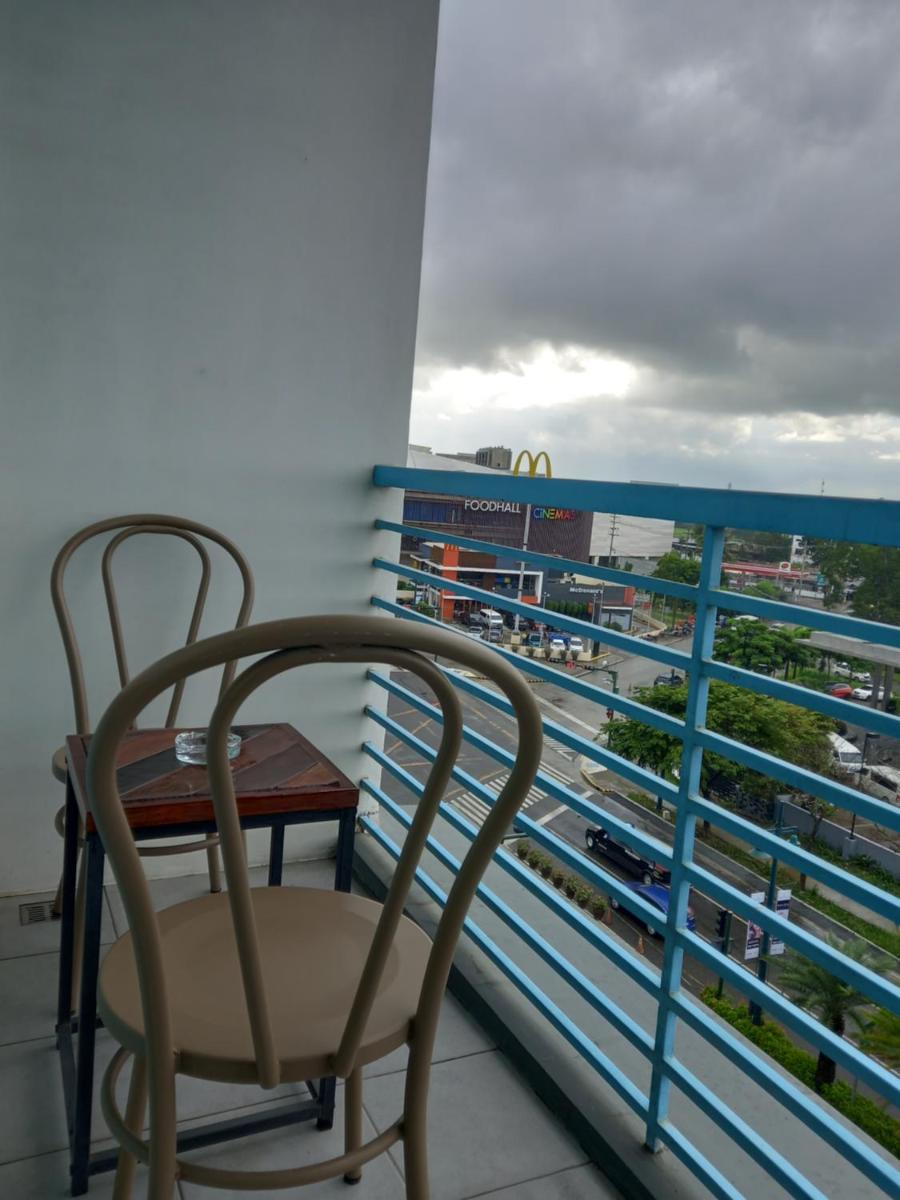 Studio Unit, Homely Condo at One Madison Place near Iloilo Business Park PH. - Housity
