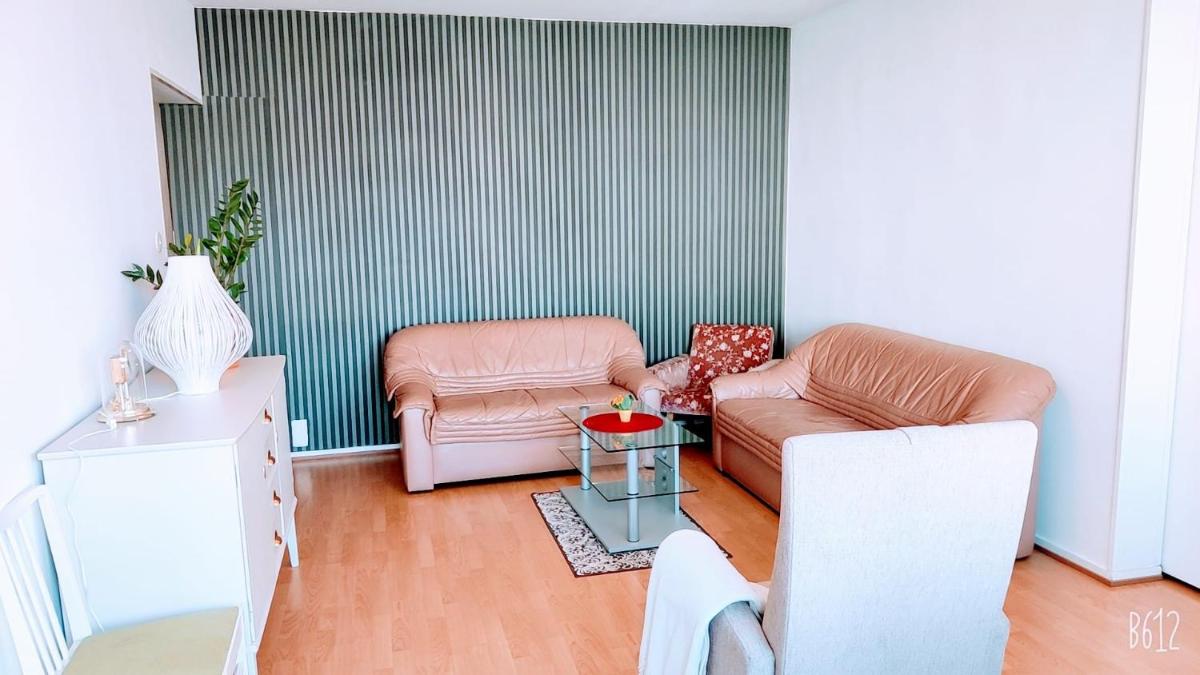 Suitetrails - Joensuu city center, WIFI internet, prime location heart of center, Big 69 sq apartment, free parking, king bed, electric car station, beautiful, relaxing, fully furnished, Big TV 55', 2 bedroom and one big living hall room