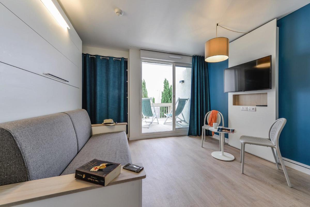 Télévision ou salle de divertissement dans l'établissement Belambra Clubs Port Camargue - Les Salins