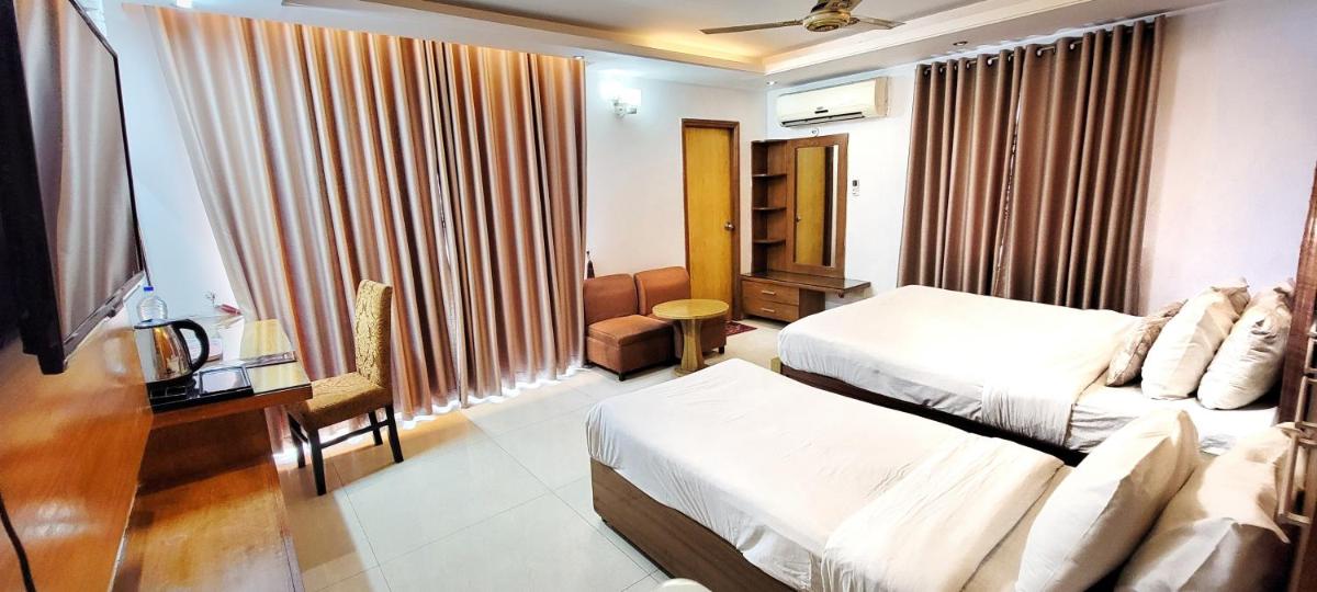 Hotel Afford Inn - Housity