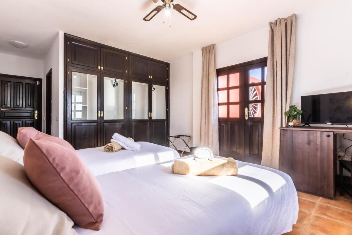 Cama o camas de una habitación en Hotel Ecolife Tenerife