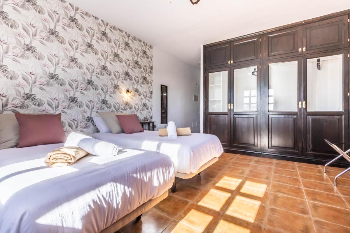 Cama o camas de una habitación en Hotel Ecolife Tenerife