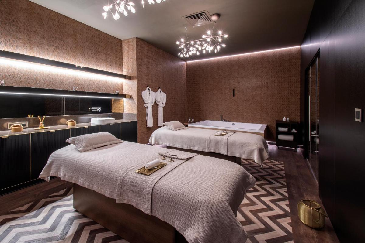 Uma cama ou camas num quarto em EPIC SANA Marquês Hotel