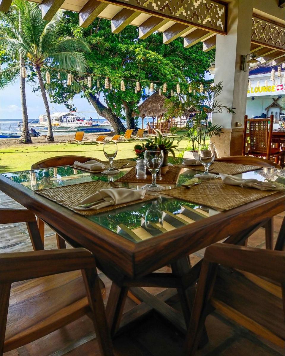 Pura Vida Beach & Dive Resort - Housity