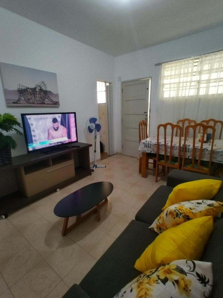 Apartamento Temporada Encantador a 200 m da Praia Gonzaguinha - Housity