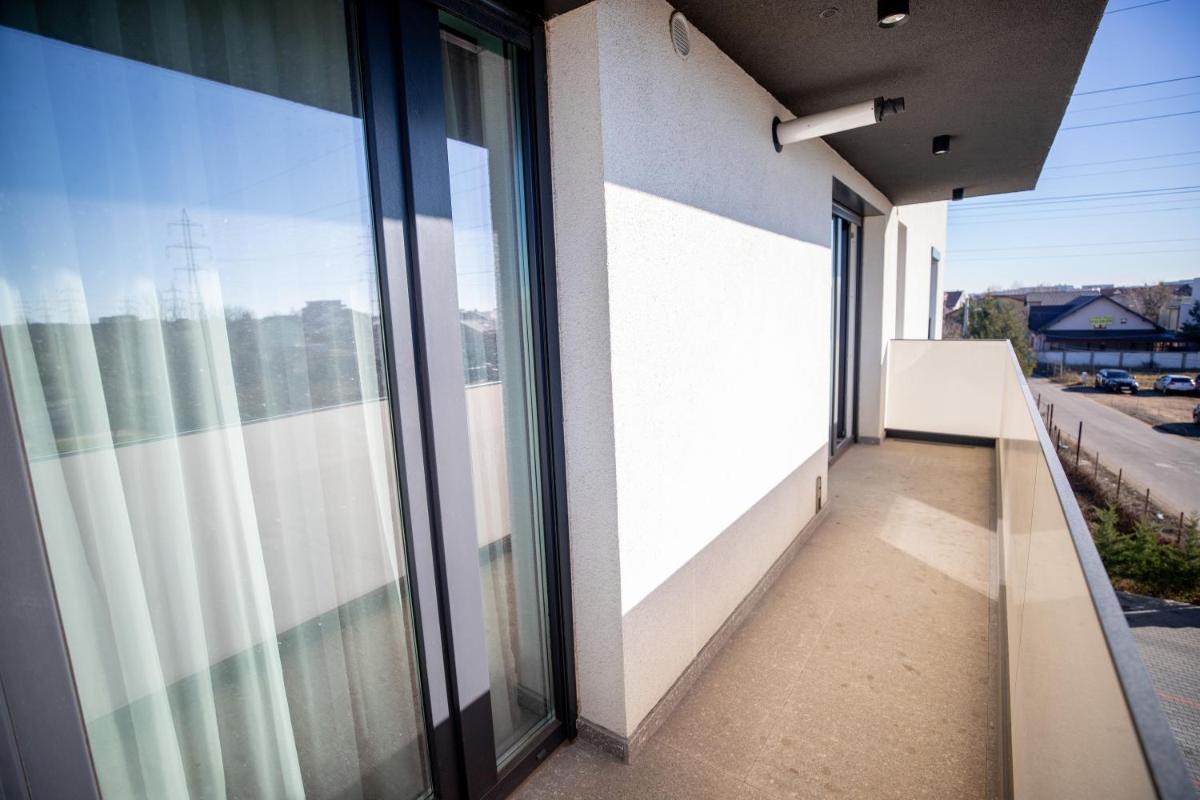 Burgundy Ploiesti Apartments - Housity