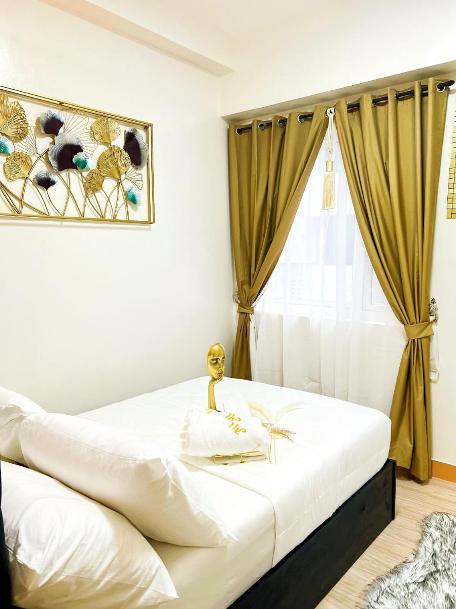 MCHD Condo Hotel Suit Staycation at Trees Residences - Housity
