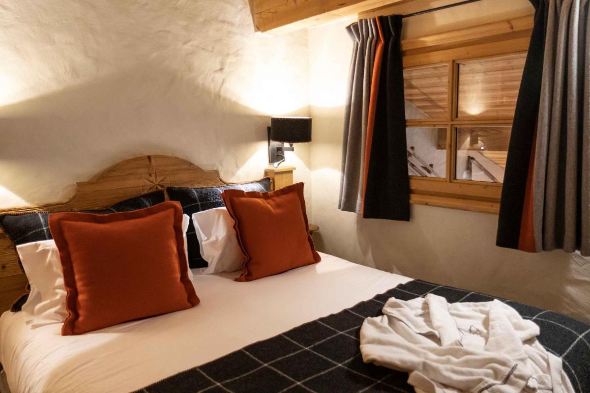 Un ou plusieurs lits dans un hébergement de l'établissement M de Megève