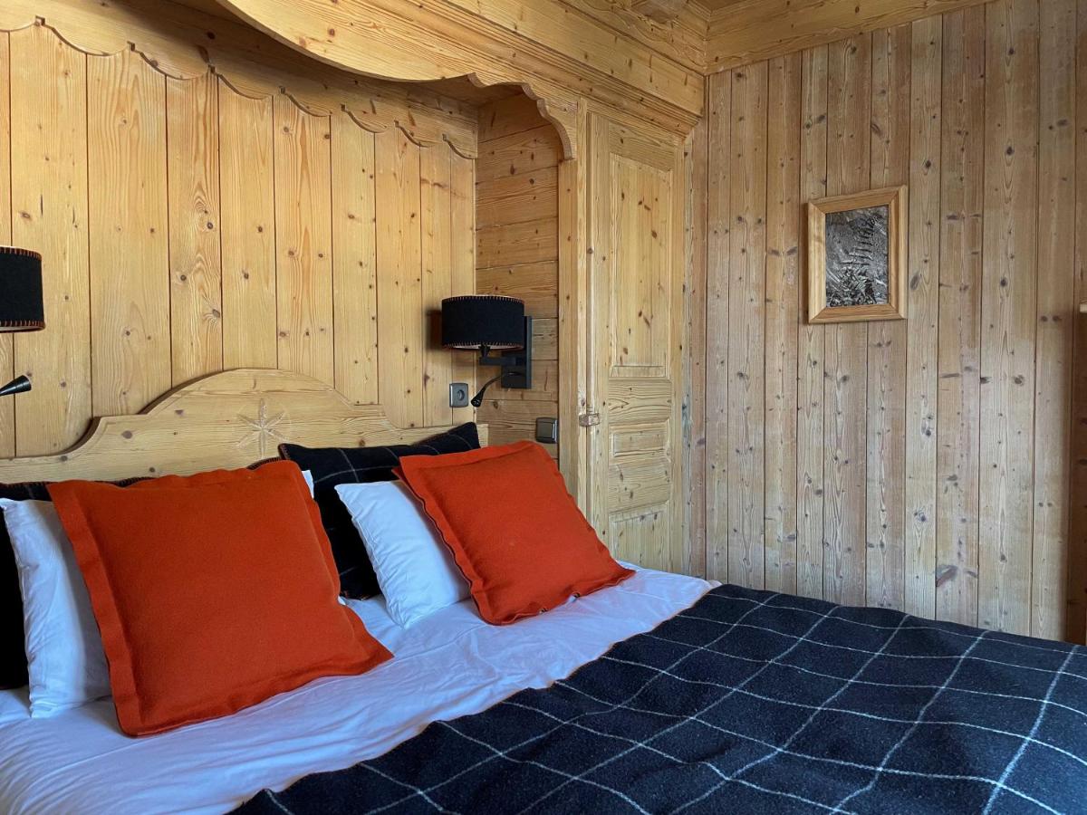 Un ou plusieurs lits dans un hébergement de l'établissement M de Megève