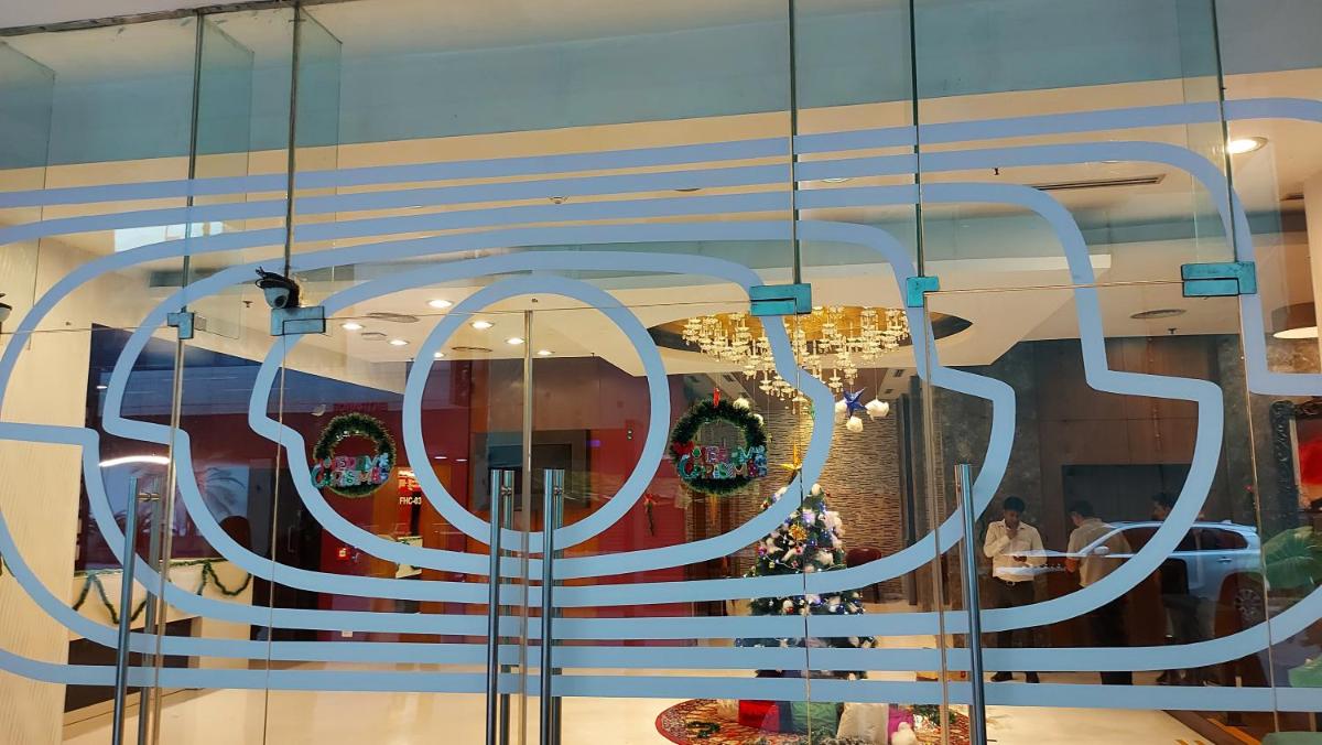 a chandelier in the window of a store at Zone Connect by The Park Saket New Delhi in New Delhi a chandelier in the window of a store at Zone Connect by The Park Saket New Delhi in New Delhi