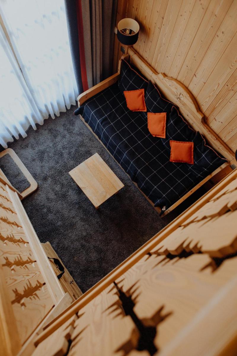 Un ou plusieurs lits dans un hébergement de l'établissement M de Megève