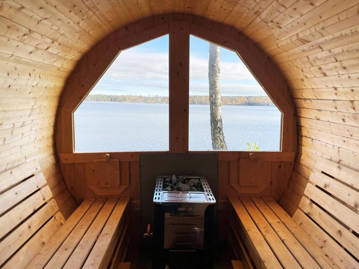 Lovely holiday home with its own lake plot and panoramic view of Rasjon - Housity