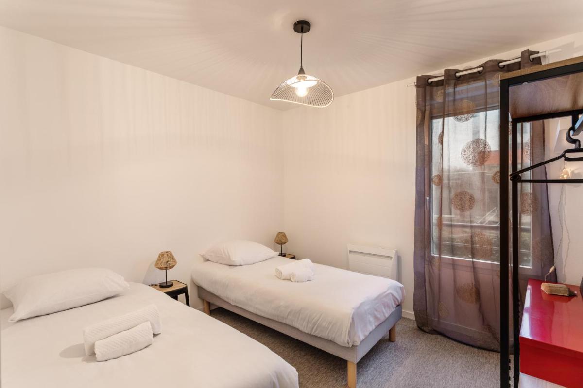 Le Bonnet Rouge - Appartement 2 chambres avec parking - Housity