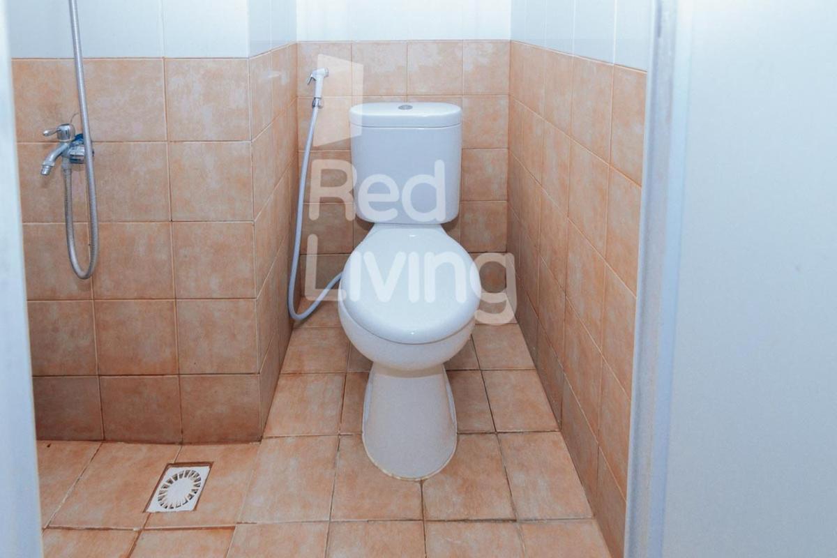 RedLiving Apartemen Green Pramuka - Family Group Tower Orchid - Housity