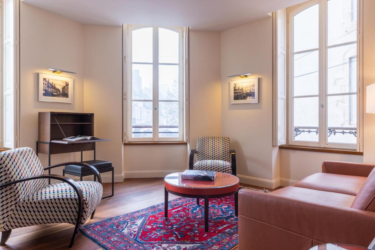 Coin salon dans l'établissement L'Hôtel