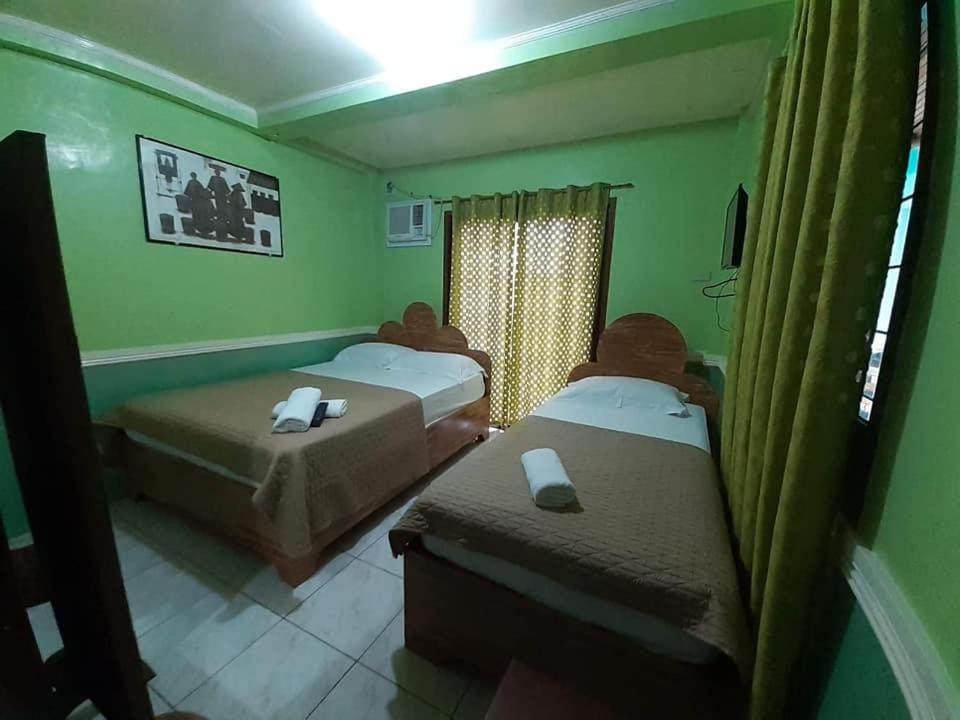 Santimart Backpackers Coron - Housity